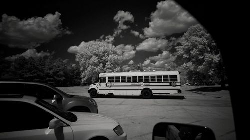 Car on street against sky