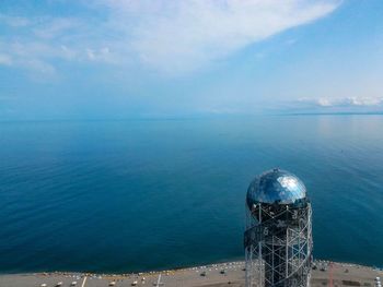 High angle view of sea against blue sky