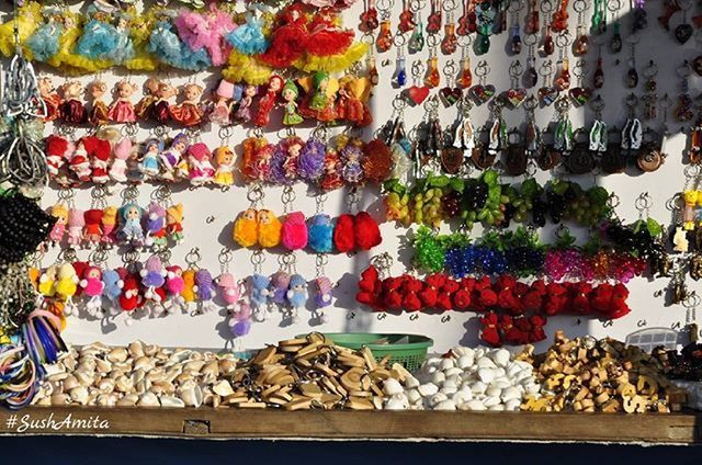 variation, for sale, abundance, multi colored, retail, choice, large group of objects, food, food and drink, market, market stall, freshness, arrangement, store, indoors, display, in a row, collection, sale, still life