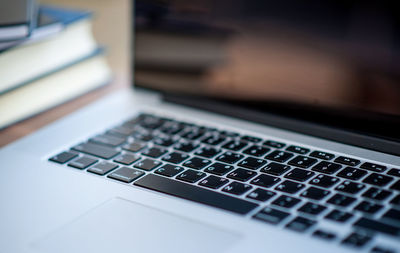 Close-up of computer keyboard on table