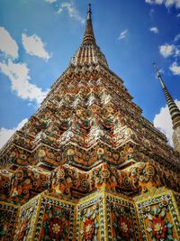 Low angle view of temple against building