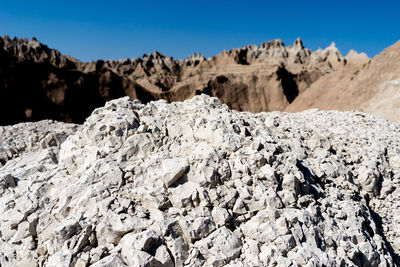 Scenic view of rock formations against sky