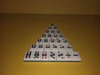 High angle view of directional sign on table