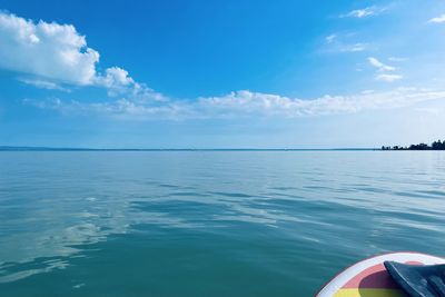 Scenic view of sea against blue sky