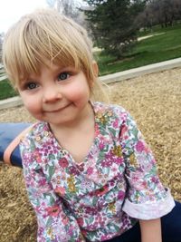 Portrait of cute girl smiling