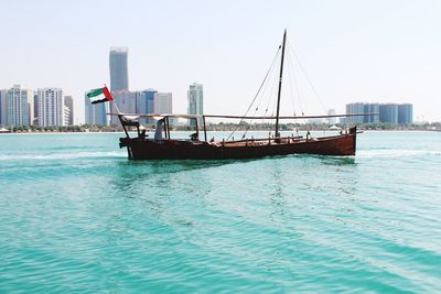 View of built structure by sea