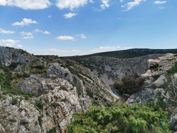 Scenic view of rocky mountains against sky