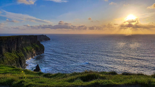 Scenic view of sea against sky during sunset