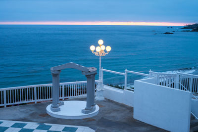 Scenic view of calm sea against blue sky