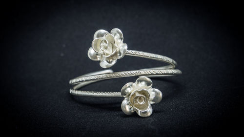 Close-up of flower bouquet against black background