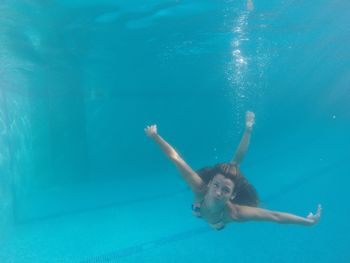 Woman swimming in pool