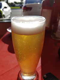 Close-up of beer glass on table