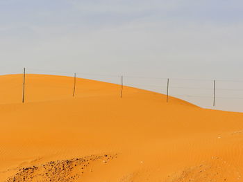 Scenic view of desert against clear sky