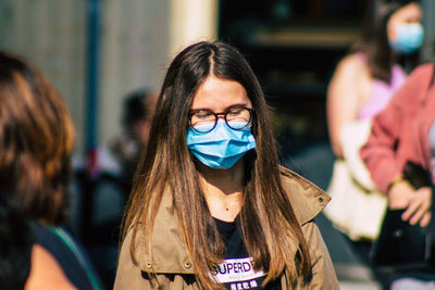 Portrait of young woman outdoors