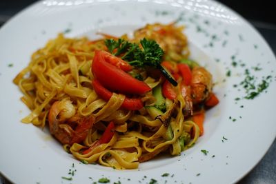 Close-up of noodles served in plate