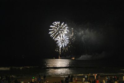 Firework display at night