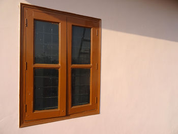 Close-up of window against building