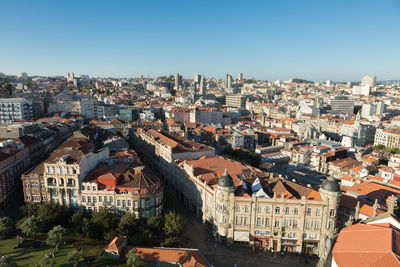 High angle shot of townscape against clear sky