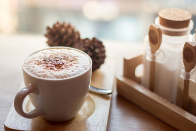 Close-up of cappuccino on table