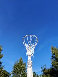 Netball hoop and the blue sky