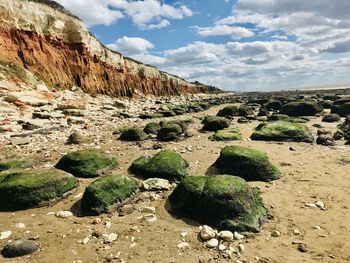 Scenic view of rocks against sky