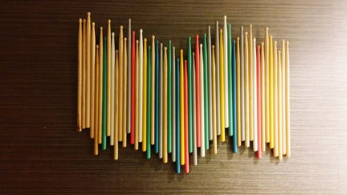 High angle view of multi colored pencils on table
