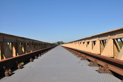 View of bridge against clear blue sky