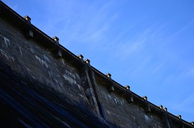 Low angle view of old building against sky