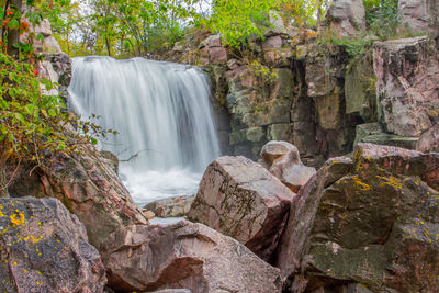 Scenic view of waterfall in forest