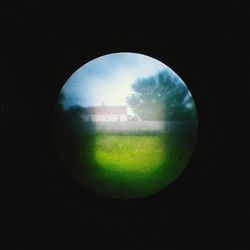 Low angle view of moon in the dark