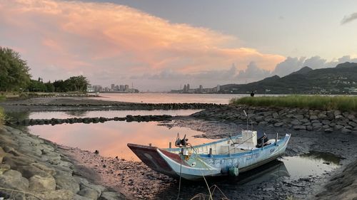 Scenic view of lake against sky during sunset