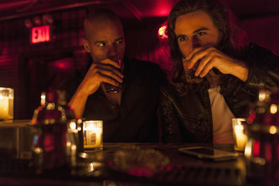 Young men hanging out at a nightclub