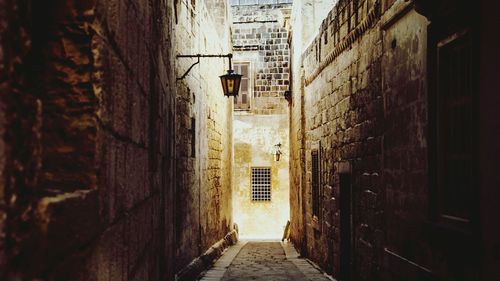 Narrow alley along buildings
