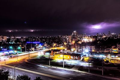 Illuminated cityscape at night