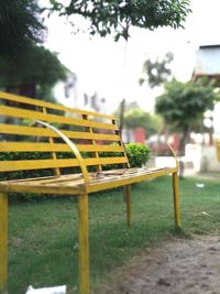 Close-up of chair on grass