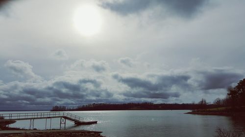 Scenic view of sea against cloudy sky