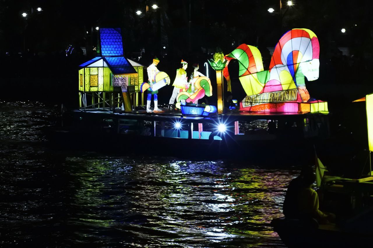 night, water, illuminated, multi colored, light, transportation, nature, vehicle, reflection, architecture, arts culture and entertainment, no people, outdoors, mode of transportation