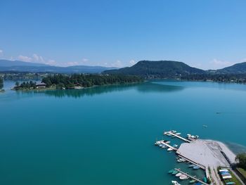 Scenic view of lake against blue sky