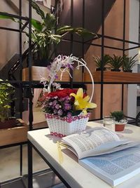 Flower vase on table at home