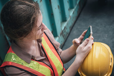 Portrait of woman using mobile phone