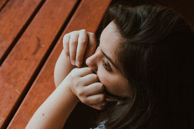 Close-up portrait of a young woman  thinking calmly 