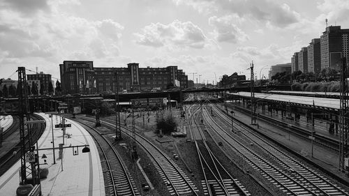 High angle view of railway tracks against cloudy sky