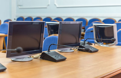 Computer monitors on table