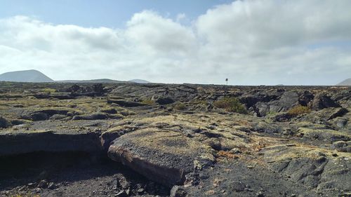 Scenic view of land against sky