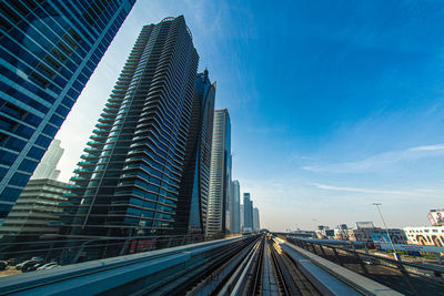 Low angle view of modern buildings against sky