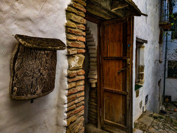 Closed wooden door of old building