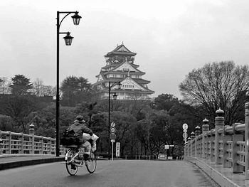 Person riding bicycle on road