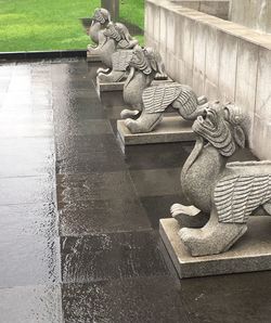 Close-up of statue against water