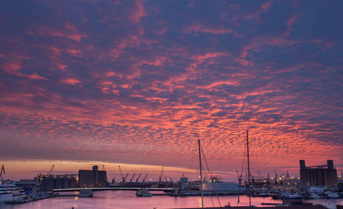 View of harbor at sunset