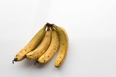 Close-up of fruit against white background